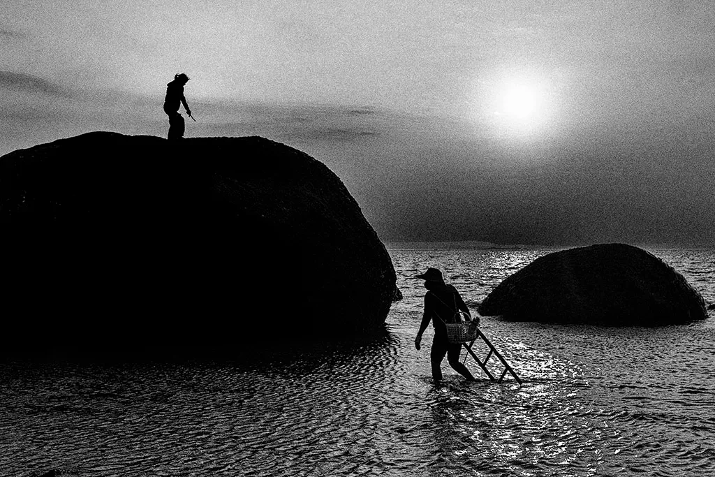 Midnight Eclipse photography series by Andras Ikladi — celestial convergence