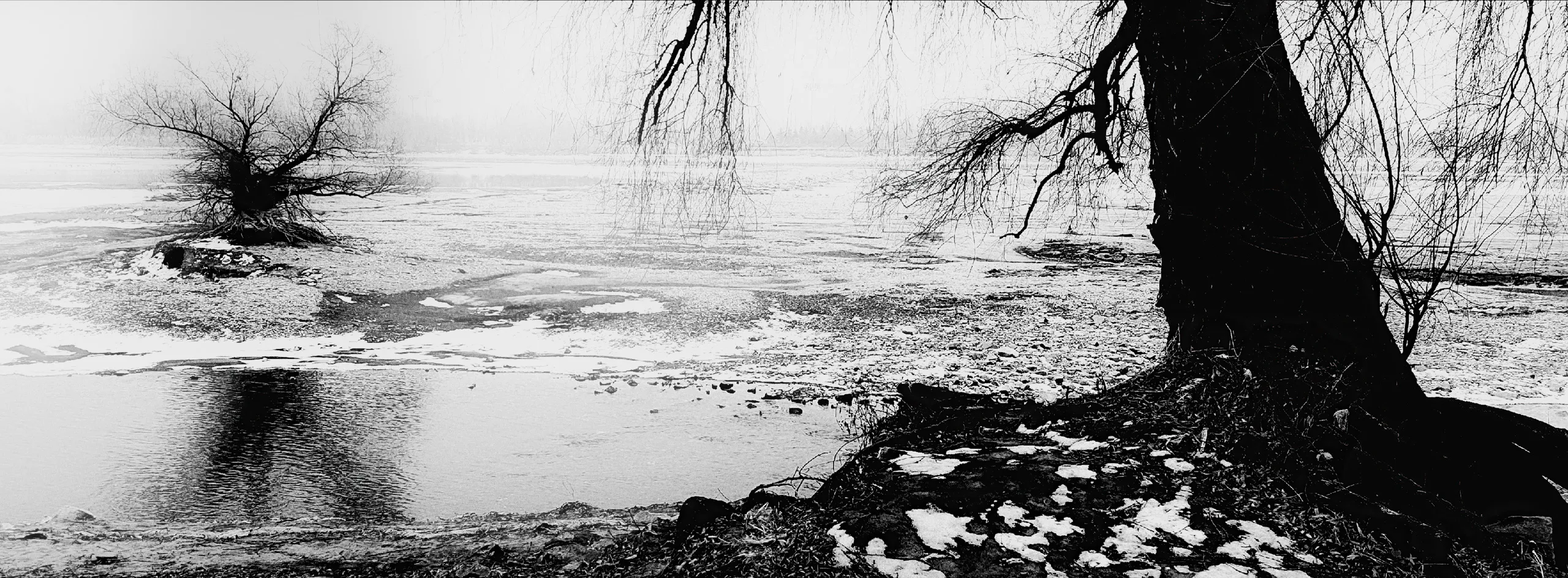 Undercurrents — HunHe River, Northeast China, photograph by Andras Ikladi, 2020