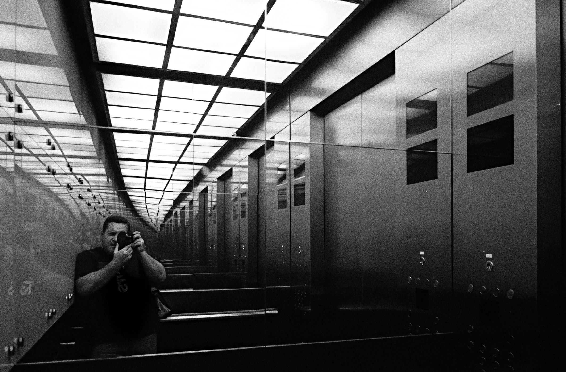 Andras Ikladi selfie in elevator